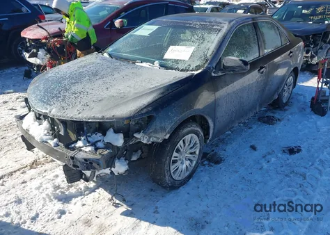 2014 Toyota Camry Le z USA, uszkodzony, nr VIN 4T4BF1FK8ER373889